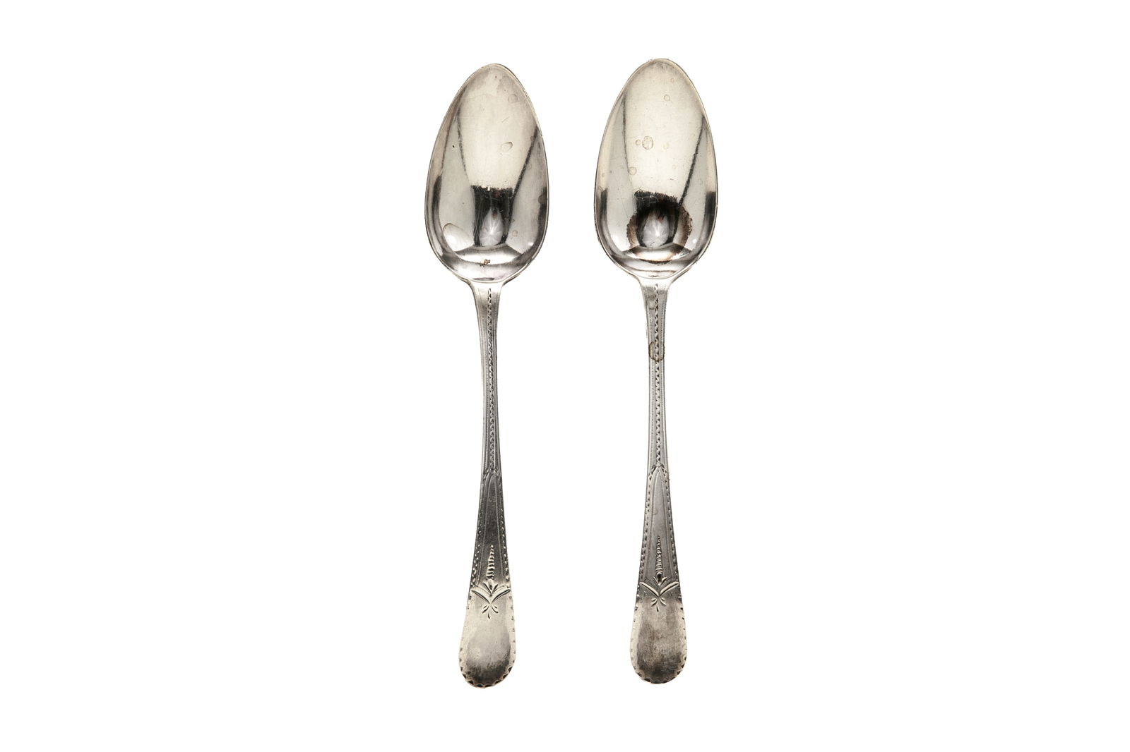 PAIR OF GEORGE III BRIGHT CUT SILVER TABLE SPOONS (1 of 2)