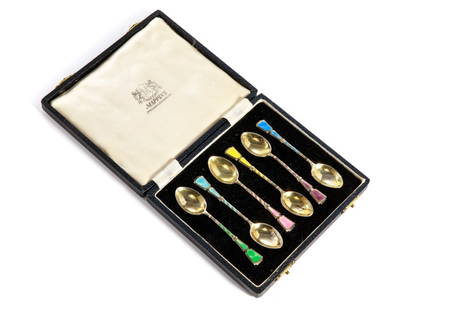 CASED ENGLISH SILVER & ENAMELLED HARLEQUIN SPOONS: With assorted coloured enamel decoration on each stem with a silver gilt bowl. Each hallmarked Turner & Simpson, Birmingham, 1953 (with coronation mark), together with Made in England.Set within a