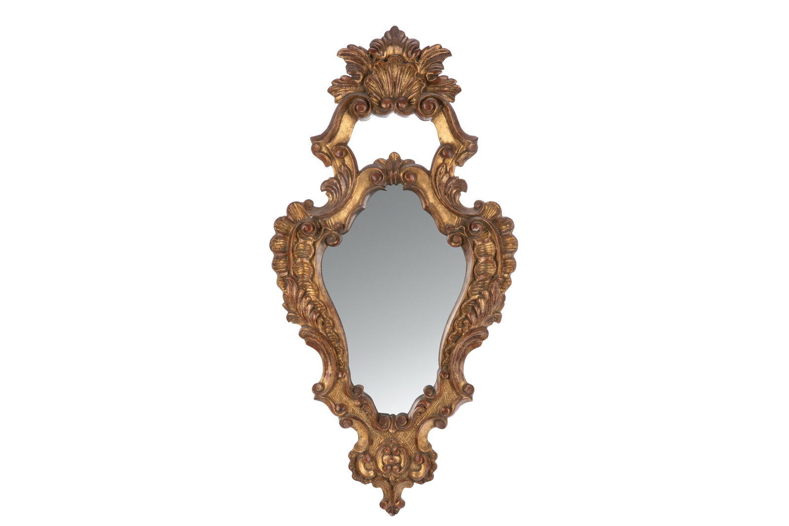 BAROQUE STYLE GILTWOOD MIRROR: Ornate carved giltwood mirror in the French or Italianate Baroque style with twisting shell and acanthus leaf border. L.: 78.7 cm (31 in.)