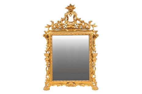 ANTIQUE CARVED GILTWOOD MIRROR: Rococo parcel gilt mirror with Chippendale influence pediment. H.: 52'' W.: 32 1/2'' D.: 32 1/2''