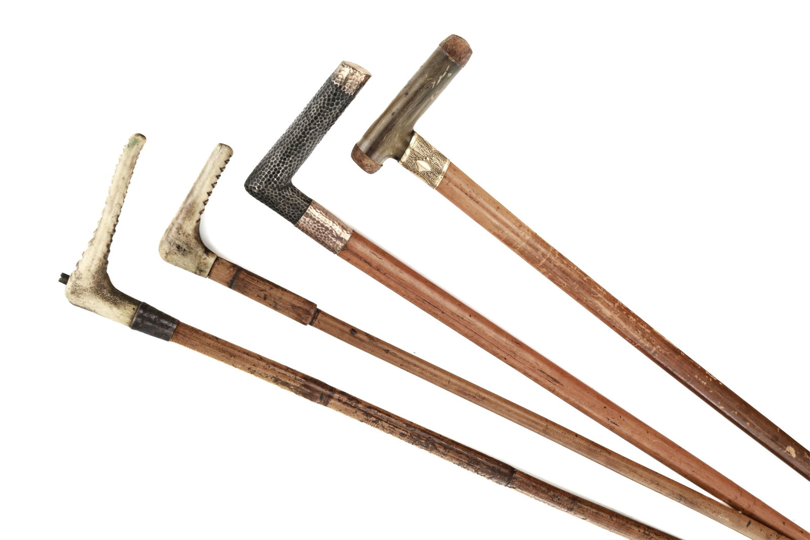 FOUR VINTAGE WALKING STICKS (1 of 1)