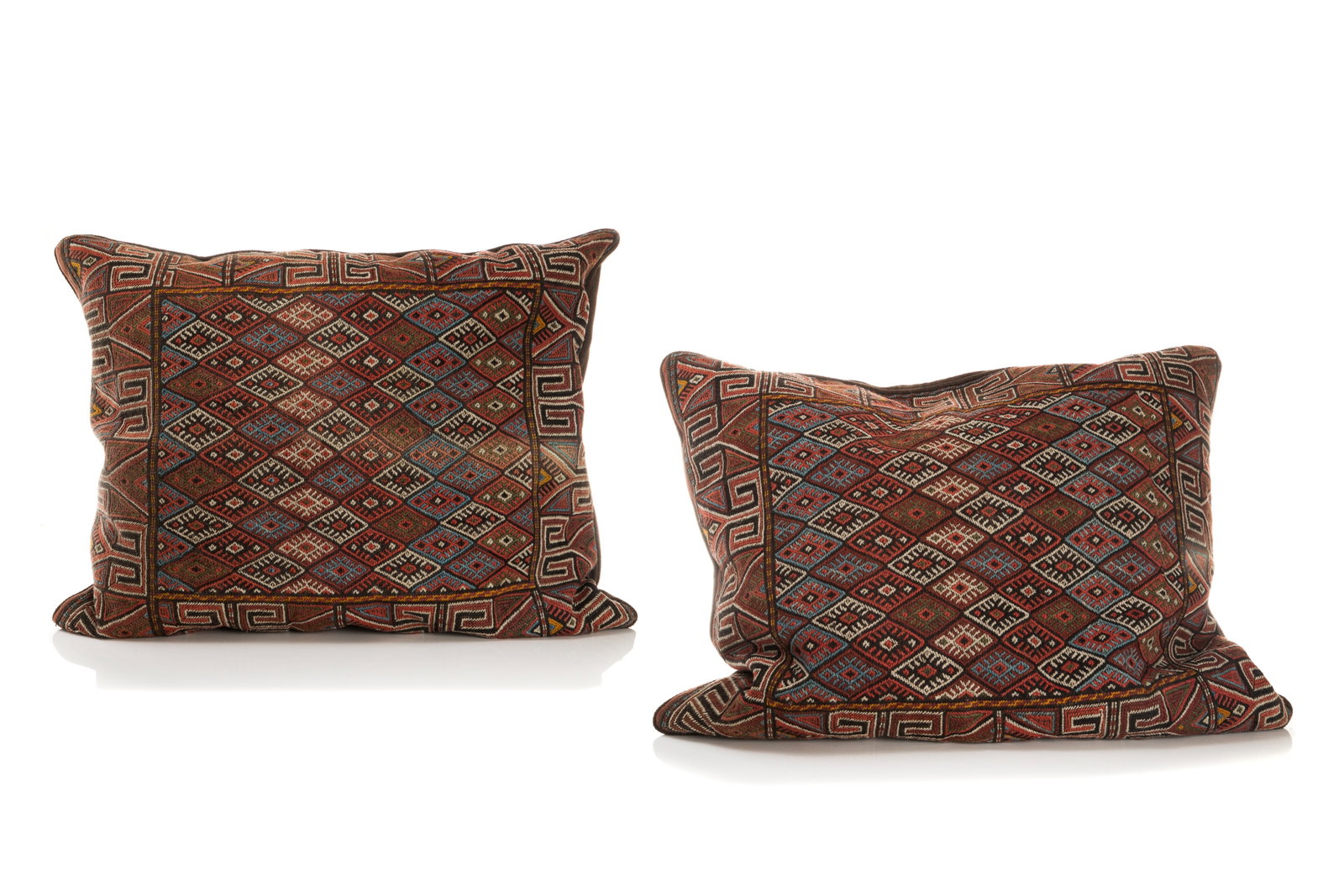 PAIR OF FLAT WEAVE TRIBAL FRAGMENTS AS PILLOWS: .