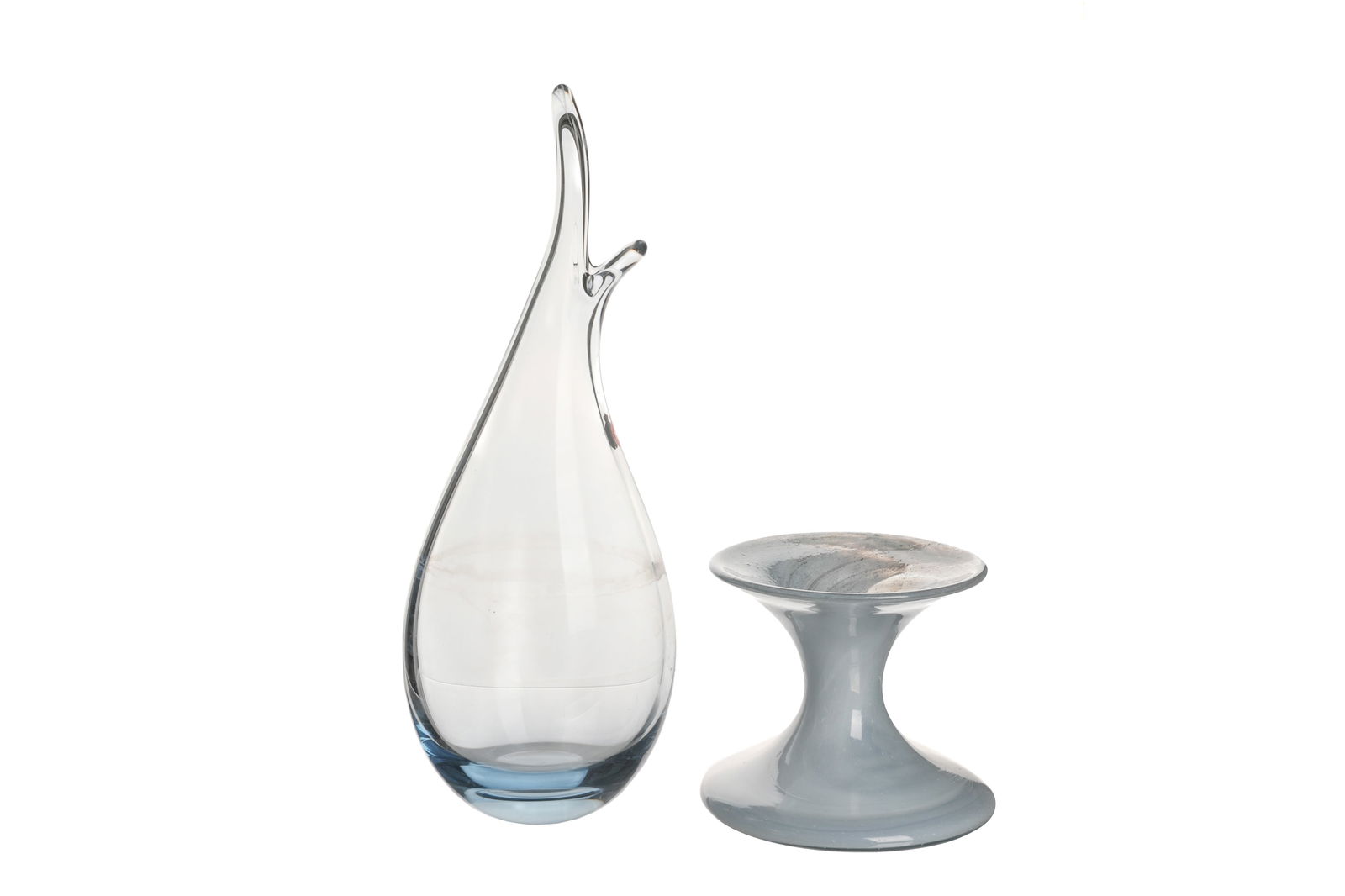 TWO HOLMEGAARD PER LUTKEN GLASS VASES: Including a large blue coloured glass 'beakvase', etched Holmegaard 1960, and a pedestal glass vase with marbleized effect, etched Holmegaard 676. Denmark, 20th century. H. of tallest: 40.5cm (16 in.)