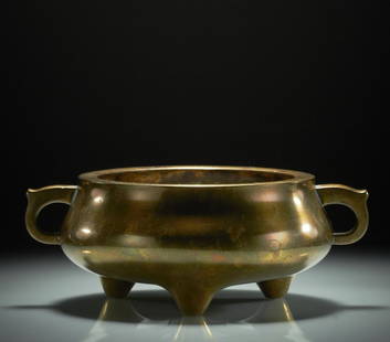 CHINESE BRONZE TRIPOD CENSER, MARKED: 銅雙耳薰爐 With loop handles and tripod feet, bearing personal collection seal to base "jia cang zhen bao," 17th-18th century. Weight of censer: 1748g. W.19cm (7.5