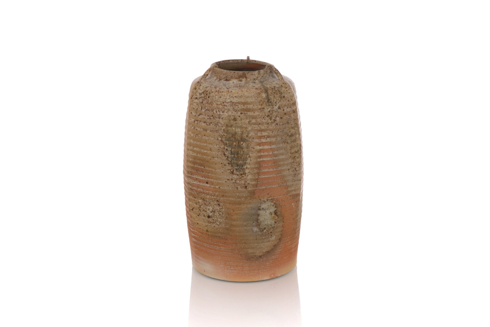 HARLAN HOUSE (Canadian b. 1943-): A cylindrical wood fired vase with ribbed exterior and orange blazes throughout. Signed. H: 13.3in (34cm) Dia: 6.6in (17cm)