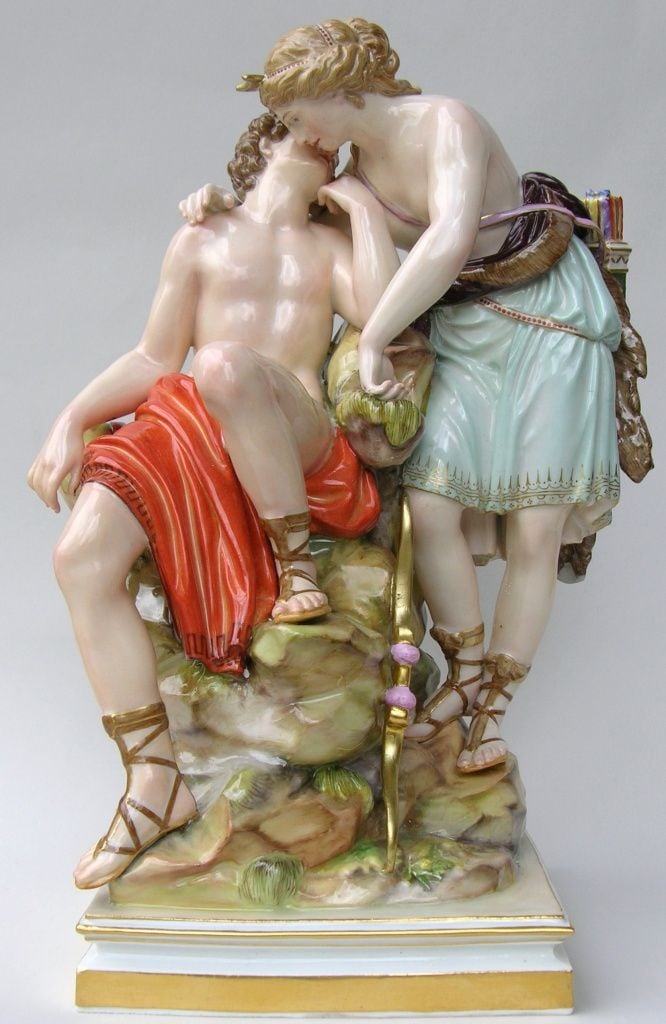 MEISSEN PORCELAIN FIGURAL GROUP: Hand-painted Meissen porcelain group depicting the goddess Diana embracing her sleeping lover, Endymion. After model by Christian Gottfried Juechtzer. Inscribed 'J8' and 101 to bottom alongwith blue c