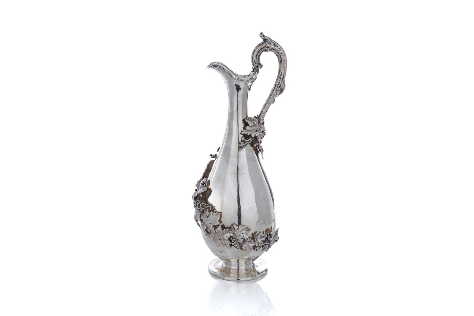 VICTORIAN FIGURAL SILVER WINE EWER, 800g: English silver wine ewer with an elongated neck and curving handle in the form of a twisting grape vine wrapping around the body towards the foot. Marks for London, John, Edward, Walter &John Barnard 