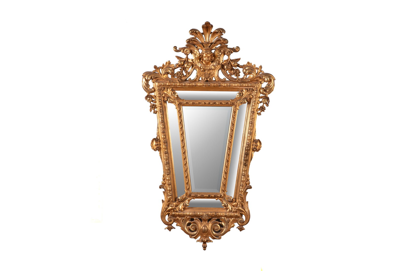 ANTIQUE CARVED GILTWOOD GESSO MIRROR: Elaborately carved and gessoed with scrolling details terminating in a figural and shell top.H.: 57'' W.: 33 1/2''