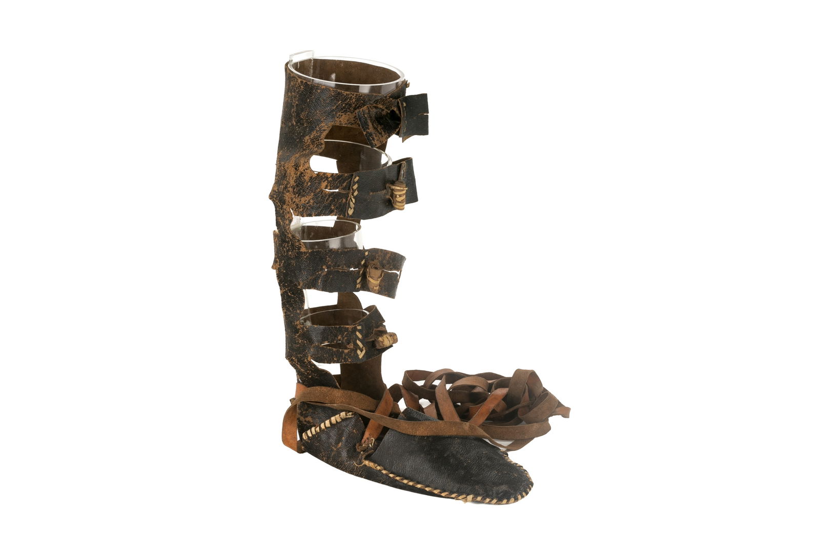 ANTIQUE HALITZA LEATHER SHOE: Made for the Beit Din, European 18th / 19th C. For the ceremonial use for a widowed woman without children to marry his brother. In woven leather. An usual very tall example.H 33cm (13in)