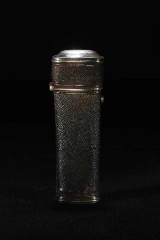 GEORGIAN ENGLISH SILVER ETUI: A Georgian silver etui mid 18th century. The body covered in black pebbled leather, marked on the base with a makers mark JT in script and pellet above . Fully fitted with implements of various dates.
