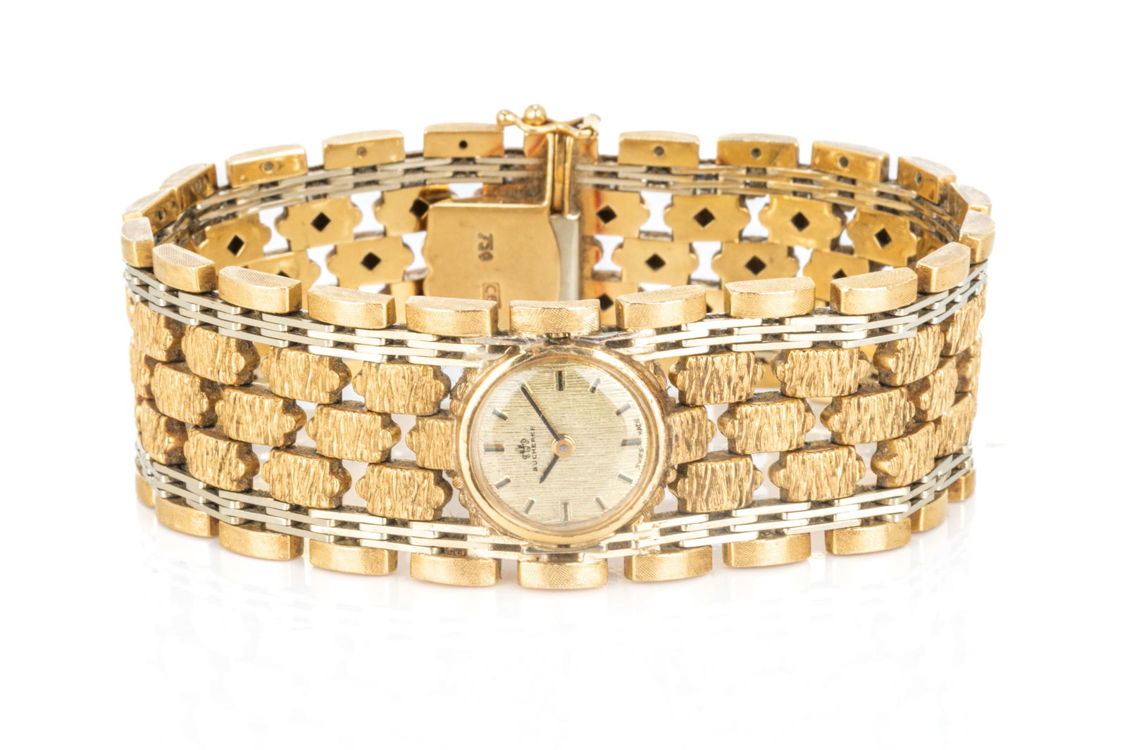 VINTAGE LADY'S 18K GOLD BUCHERER WRIST WATCH, 67g: A Brutalist design wristwatch, with wide bracelet strap comprising of seven rows of textured yellow gold and white gold links, with textured gold watch face, marked 750 to clasp. L. of strap: 19cm