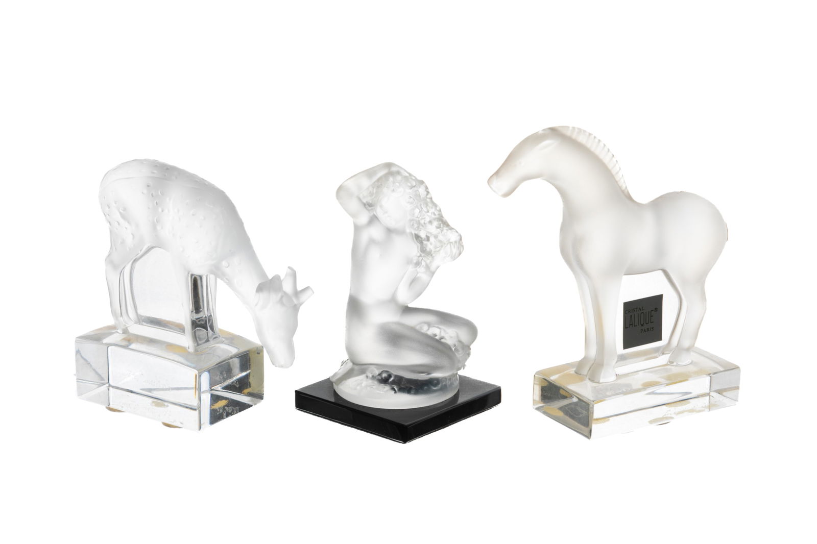 THREE LALIQUE GLASS PAPERWEIGHTS: Group of three Lalique glass miniature figures including a horse, deer, and a seated nude woman. French, 20th C.H. of horse: 10.2 cm (4 in.)