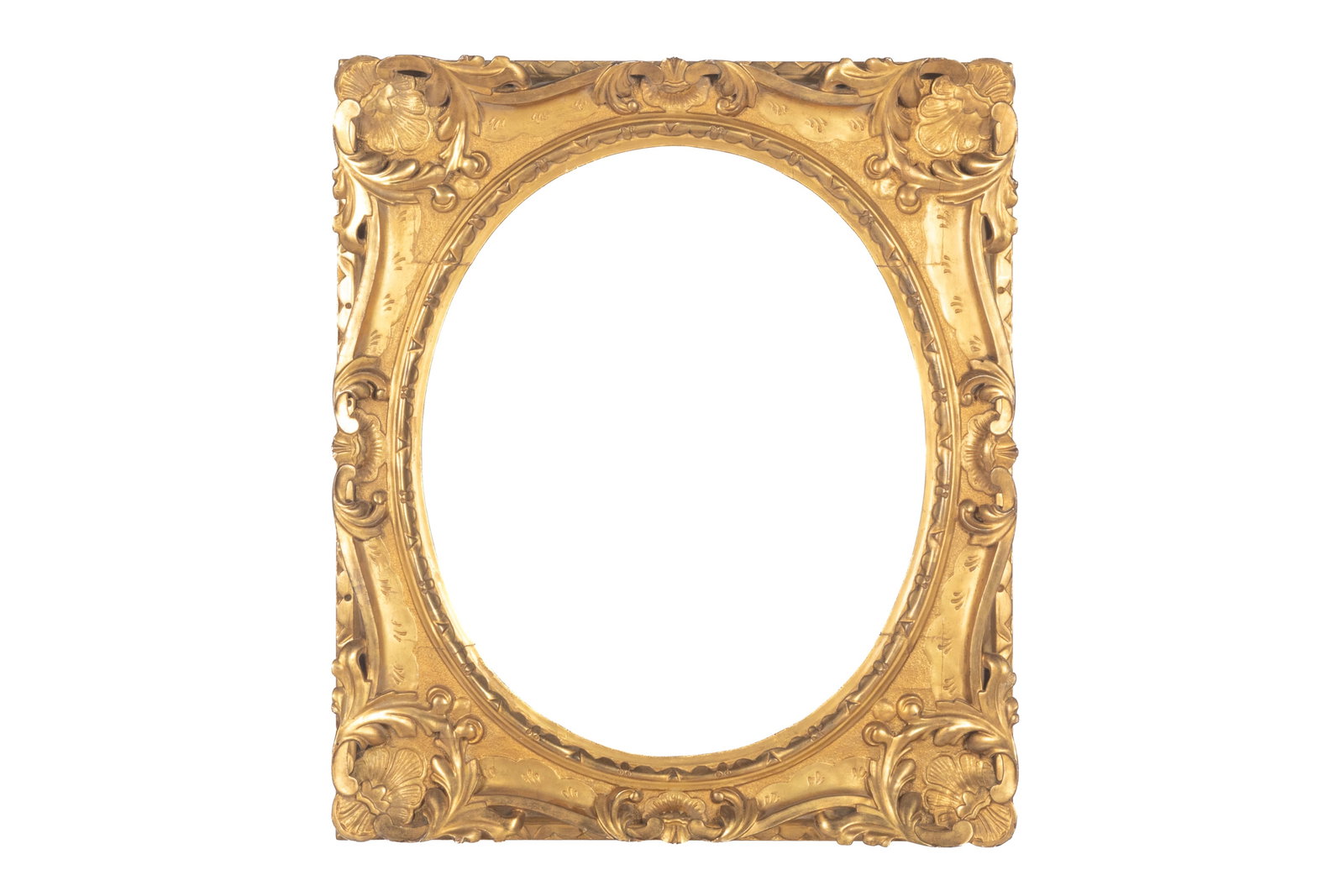 CARVED GILTWOOD OVAL FRAME. ENGLISH: Overall 30 x 26 in. Sight 23 1/4 x 19 in. (OVAL) Rebate 24 x 20 in. Provenance: Emmett's Custom Framing (Toronto)