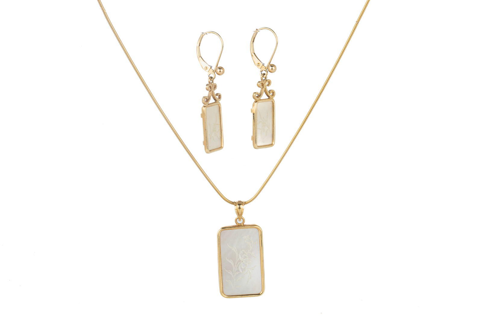 CHINESE MOTHER OF PEARL EARRINGS AND PENDANT, 9g: A pair of 14k yellow gold and carved mother of pearl earrings, with lever backings, marked 14k, together with a matching pendant on a yellow gold chain. L. of chain: 18 in.