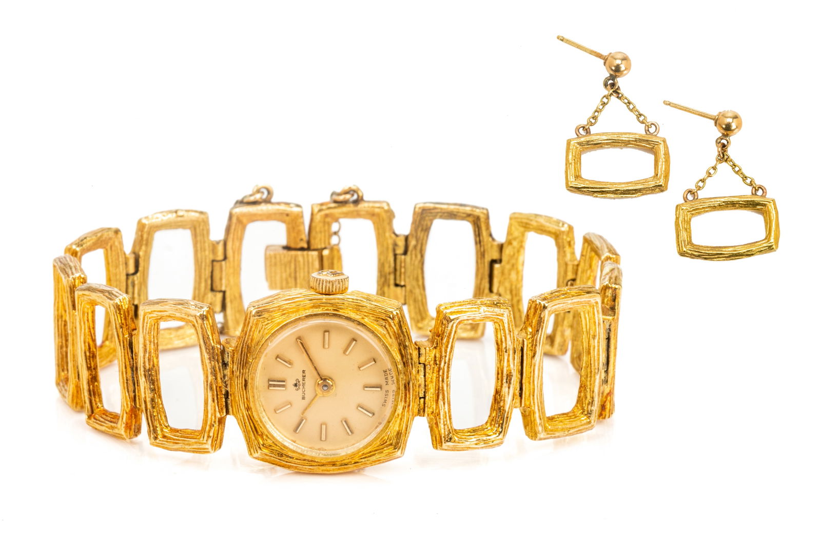 VINTAGE LADY'S 18K GOLD BUCHERER WRISTWATCH, 43g: A Brutalist design ladies cocktail wrist watch by Bucherer, the bracelet strap comprising of textured gold loop links, with gold coloured watch face and markers, marked 750 to clasp, with safety chain