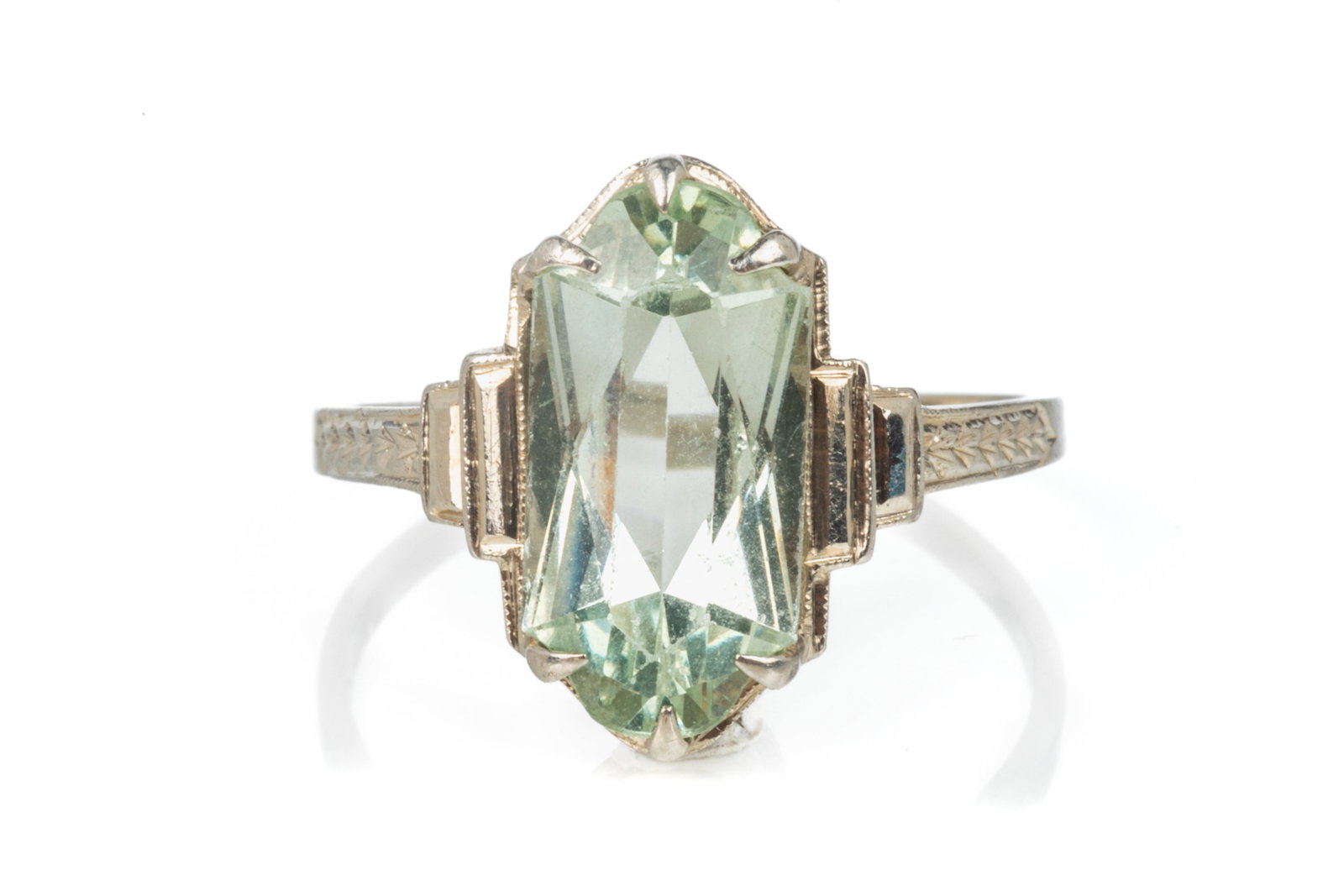 14K GOLD ART DECO STYLE RING, 3.4g: A 14k white gold dress ring set with a synthetic spinel, marked 14k, size 7 1/2.