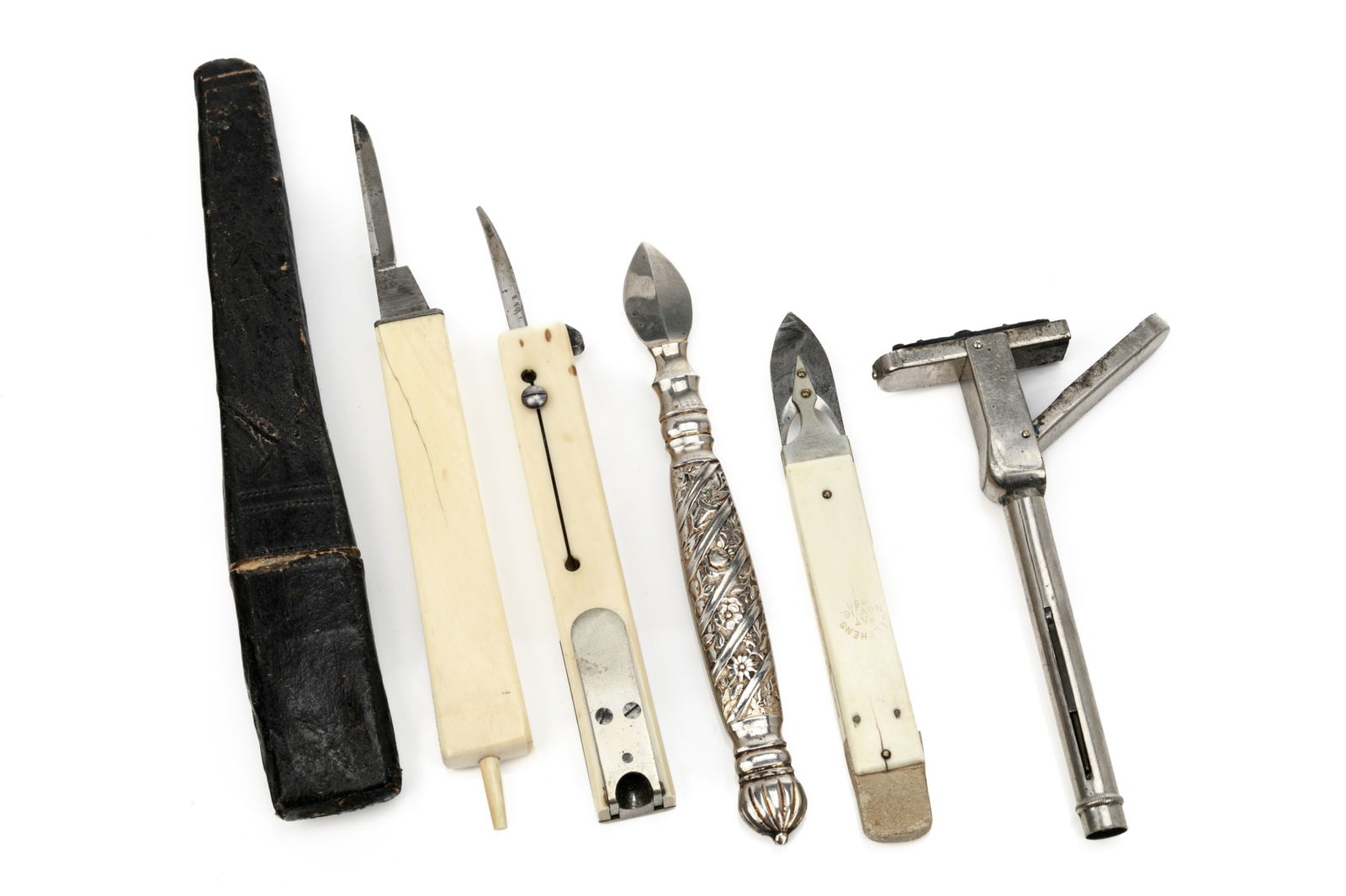GROUP OF ANTIQUE STATIONARY INSTRUMENTS: Including an Underwood Haymarket letter opener with bone handle (cracked) in original fitted box, a silver letter opener with embossed handle decoration, a letter opener marked Stephens Pat No 16, 186