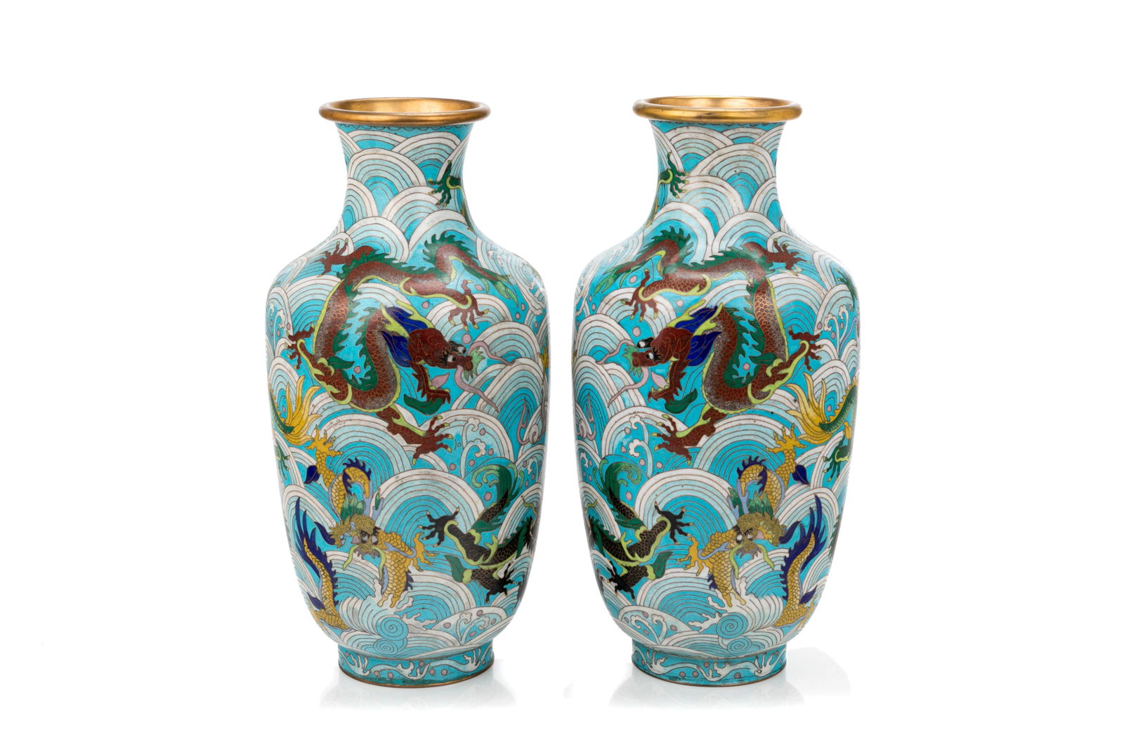 PAIR OF CLOISONNE ENAMELED BLUE GROUND VASES: Pair of identical vases, copper material with blue-toned enamel on, fully covered by the multiple curves of the oceanic navy-blue waves, with several dragons in between.