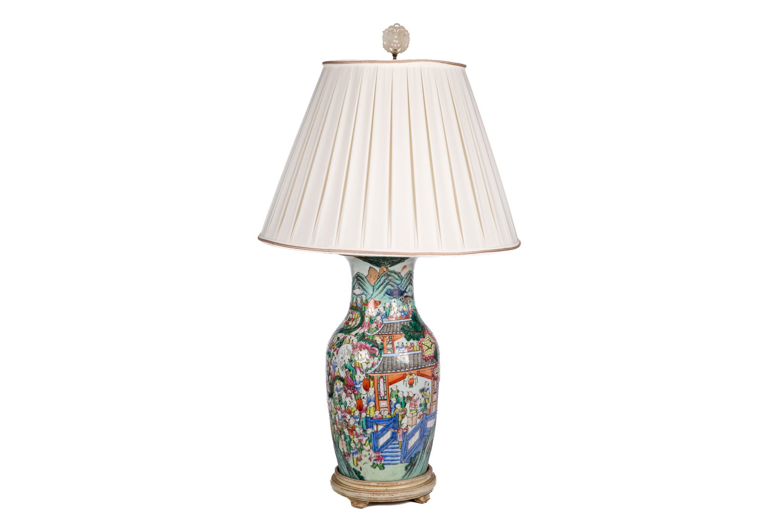 FAMILLE ROSE PORCELAIN FESTIVAL LAMP: Chinese, Qing dynasty, 19th century. Famille rose enameled vase as lamp, the outer was depicted a extravagant touring scenario duing thelantern festival that the hundreds children folks and officials