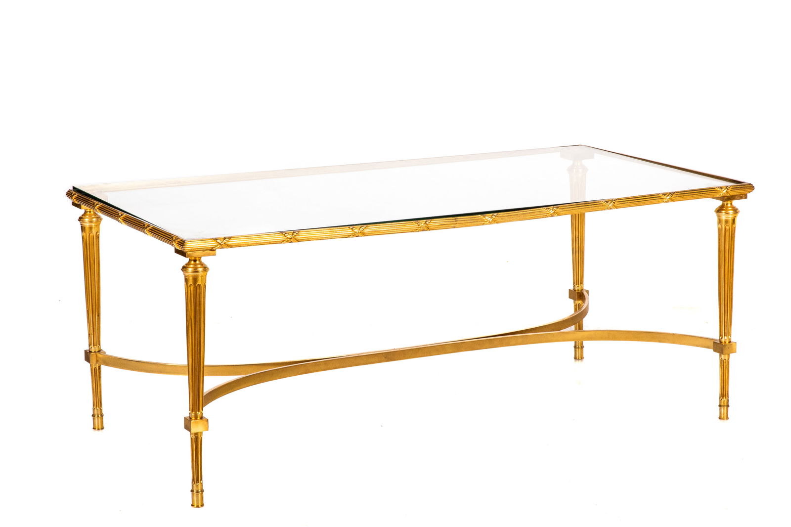 BRONZE AND GLASS COFFEE TABLE: Gilt bronze and glass coffee table with a reeded-style frame and tapering legs. 20th C. H.: 17 1/2" W.: 43 1/2" D.: 22 1/2"