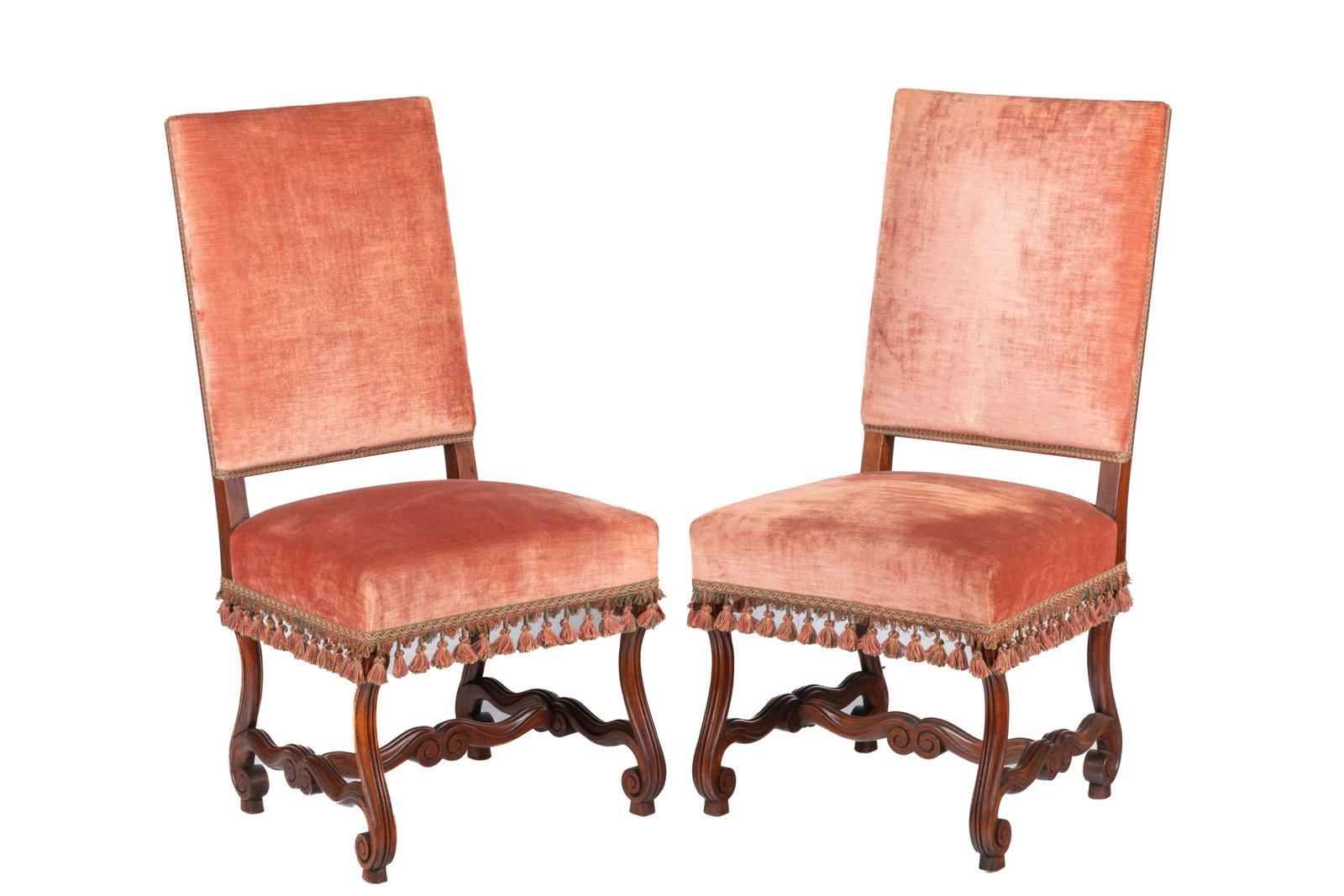 PAIR OF PINK UPHOLSTERED SIDE CHAIRS: Pair of French provincial style chairs with pink velvet upholstery and tassel trim. 19th or early 20th C. H.: 40" W.: 17 1/2" D.: 20"