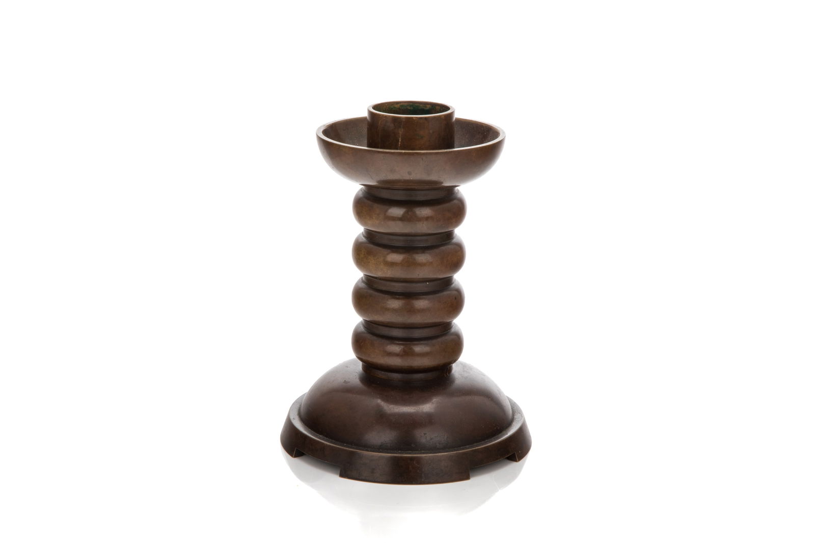ART DECO EVAN JENSEN BRONZE CANDLESTICK: Bronze candlestick designed by Evan Jensen in art deco style with a lobed stem and pronounced drip pan. Marked 'EVAN JENSEN KØBENHAVN BRONZE 320'. Danish, early 20th C. H.: 17.8 cm (7 in.)