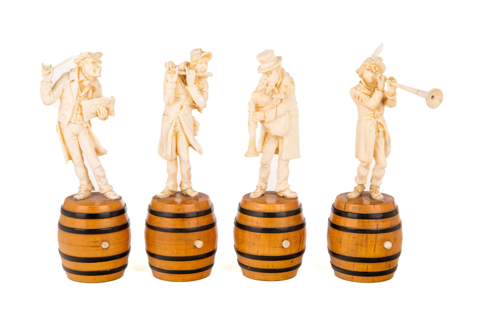 A SET OF FOUR CARVED MUSICIANS (1 of 2)