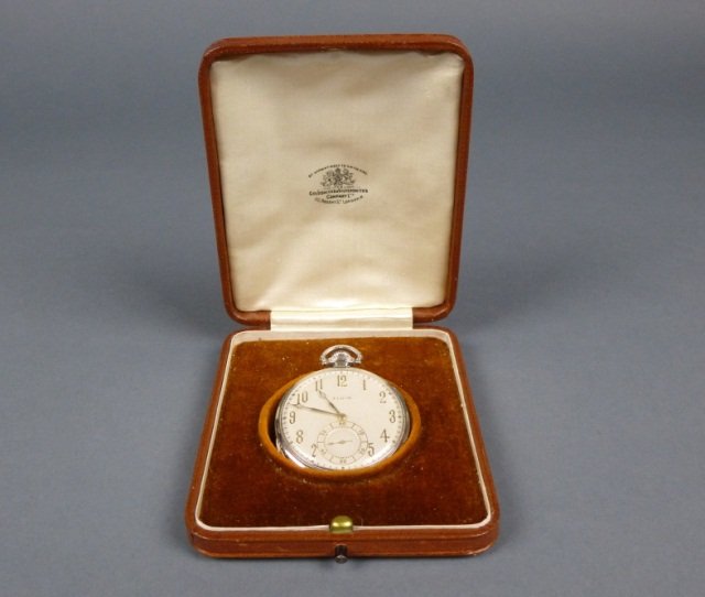 ELGIN 14K GOLD CRUSADER POCKET WATCH, CIRCA 1926: - ivory face with gold Arabic markers and sub seconds, G.M. Wheeler, 17 jewels, 6 adjustable movement # 28982447, Wadsworth 14k case. Retailed by Goldsmiths & Silversmiths Co., London. Comes in origin