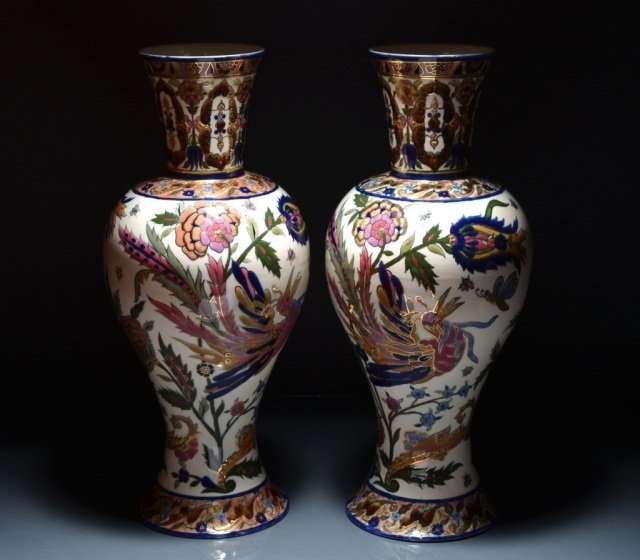 PAIR OF ERNST WAHLISS ART NOUVEAU POTTERY VASES: - with Persian foliate decoration and gilding, for Zsolnay, late 19th century. H of each: 46.35 cm. (18 1/4 in.).