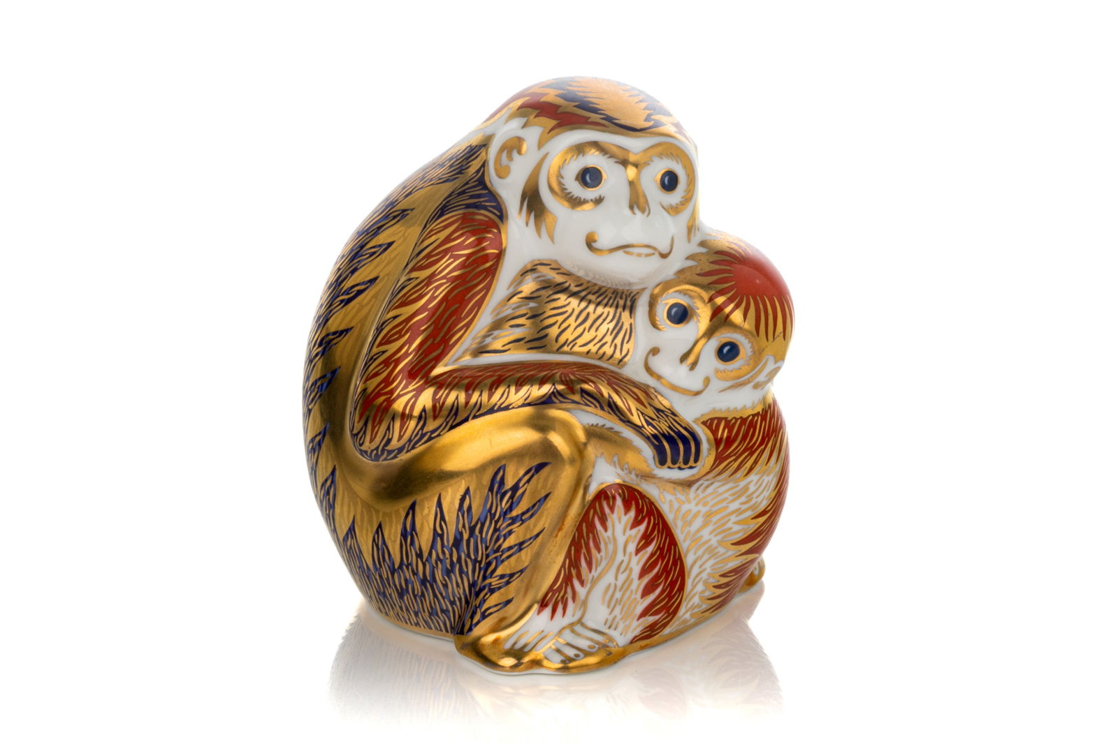 ROYAL CROWN DERBY MONKEY AND BABY PAPERWEIGHT: Royal Crown Derby 'Monkey and Baby' paperweight launched to mark the Chinese Year of the Monkey. Marked for Royal Crown Derby in red to the underside and with gold stopper. English, 20th C. H.: 10 cm