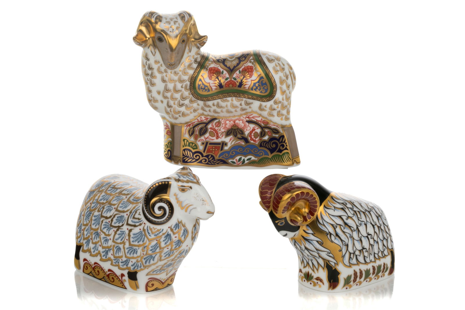 THREE ROYAL CROWN DERBY RAM PAPERWEIGHTS (1 of 3)