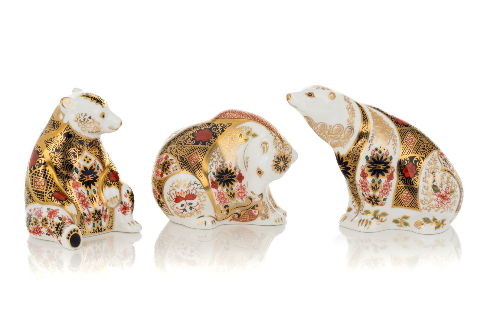 THREE ROYAL CROWN DERBY 'OLD IMARI' PAPERWEIGHTS (1 of 3)