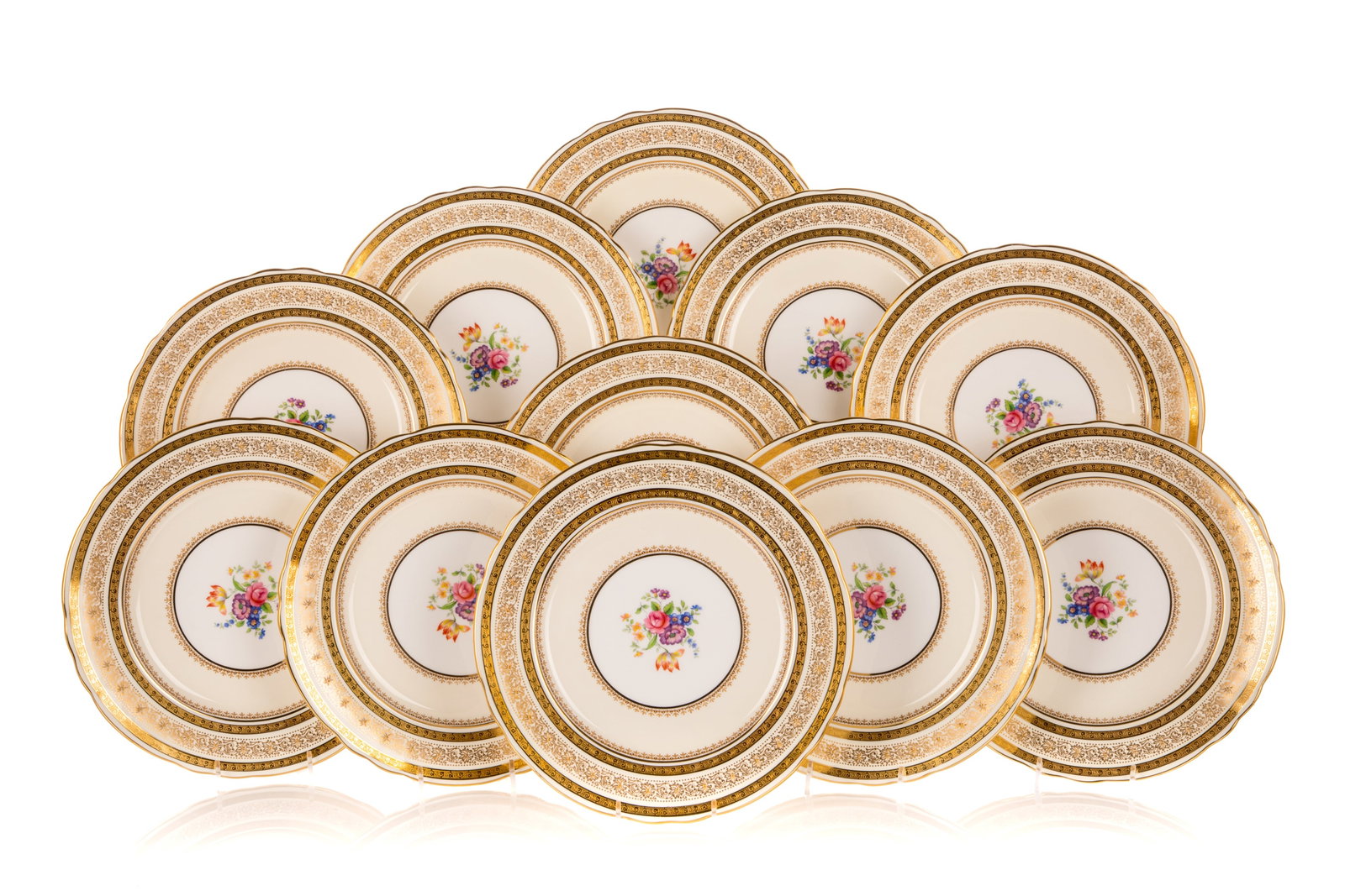 BOXED SET OF TWELVE AYNSLEY DINNER PLATES: Boxed set of twelve Aynsley dinner plates. All on cream ground with embossed gold borders, various botanical motifs, and hand-painted floral bouquets to the centre. Marked for Aynsley in green to the 