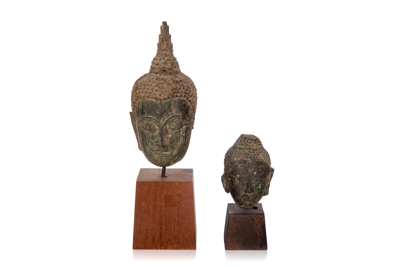 TWO THAI BRONZE BUDDHA HEADS ON STANDS (1 of 5)