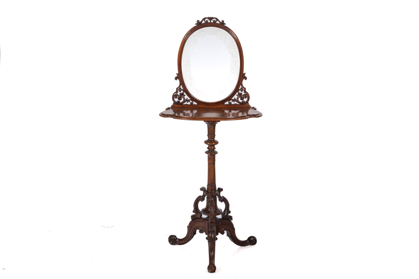 VICTORIAN BURLED WALNUT TOILET MIRROR TABLE: Pedestal carved base and plateau, glass, likely originally a mirror. English, 19th C. H.: 47" x W.: 20" x D.: 11"