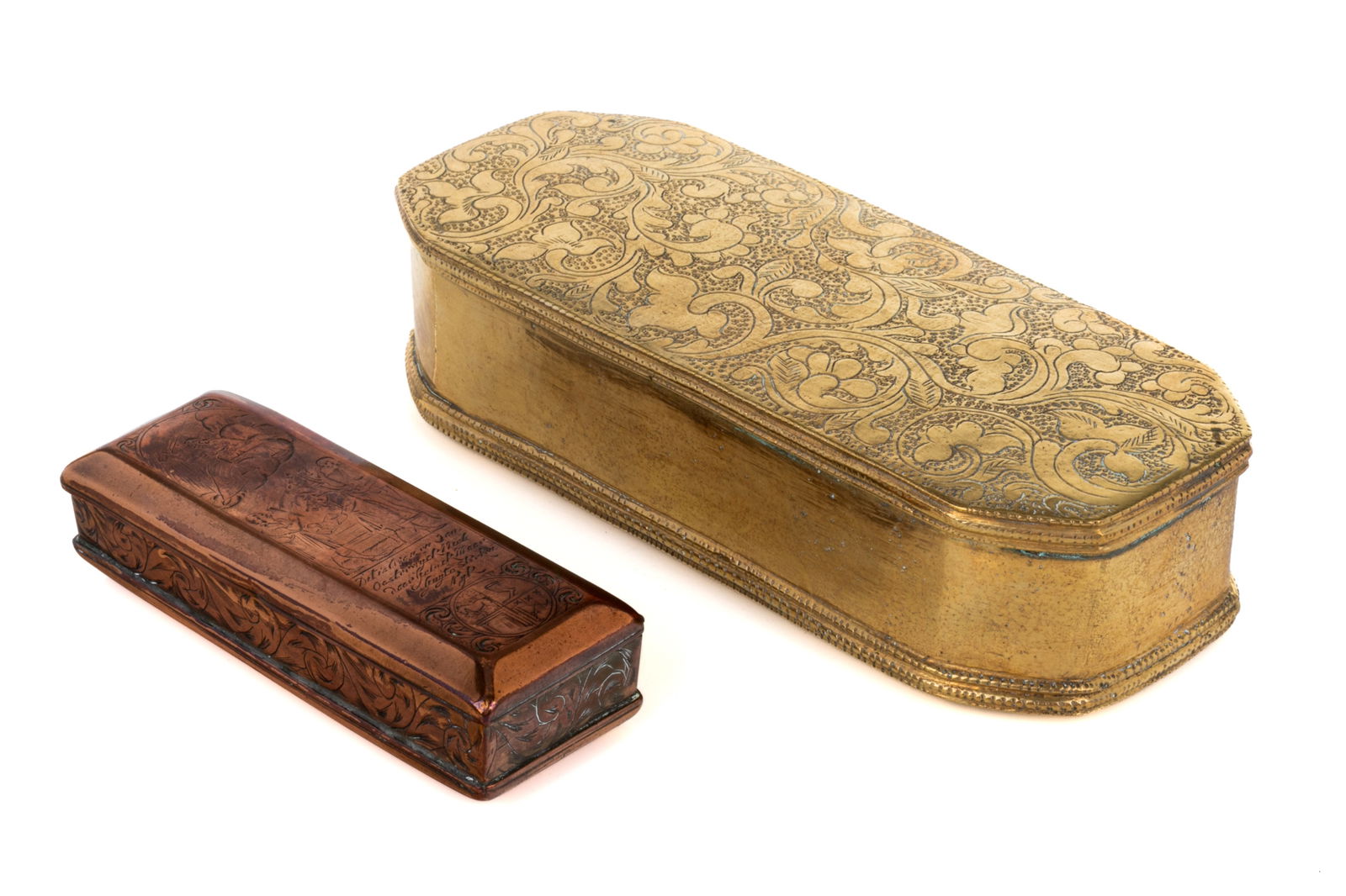 TWO EARLY BRASS AND COPPER BOXES: Two decorative boxes, one in copper and the other in gilt bronze. Both engraved with elaborate details, one with foliate motifs and the other with a German judicial scene. German and possibly Dutch, 1