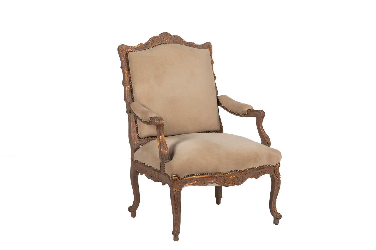 FRENCH ANTIQUE CARVED GILTWOOD ARMCHAIR: In modern suede upholstered and studded detail. H 42 X W 30 X D 24in