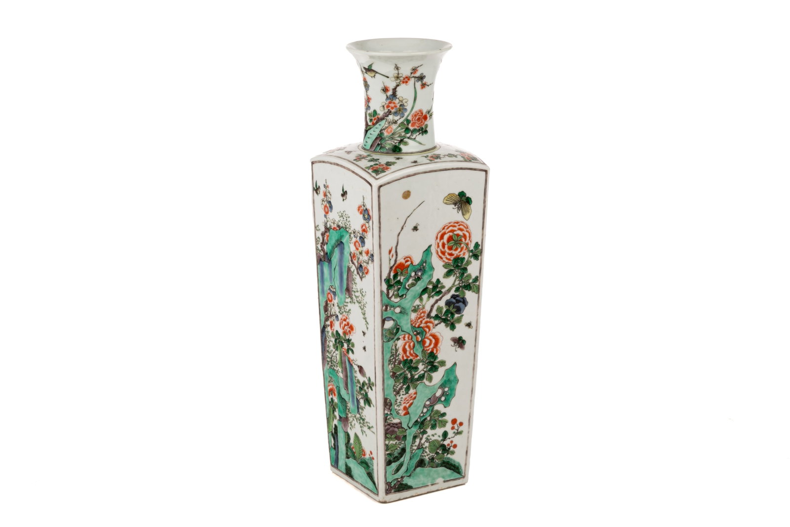 CHINESE FAMILLE VERTE SQUARE VASE: Of square section, tapering to a hidden foot ring, cylindrical neck rising to an everted rim and decorated in a famille verte palette, the sides with rock and blossom pattern in Kangxi manner. An Arte