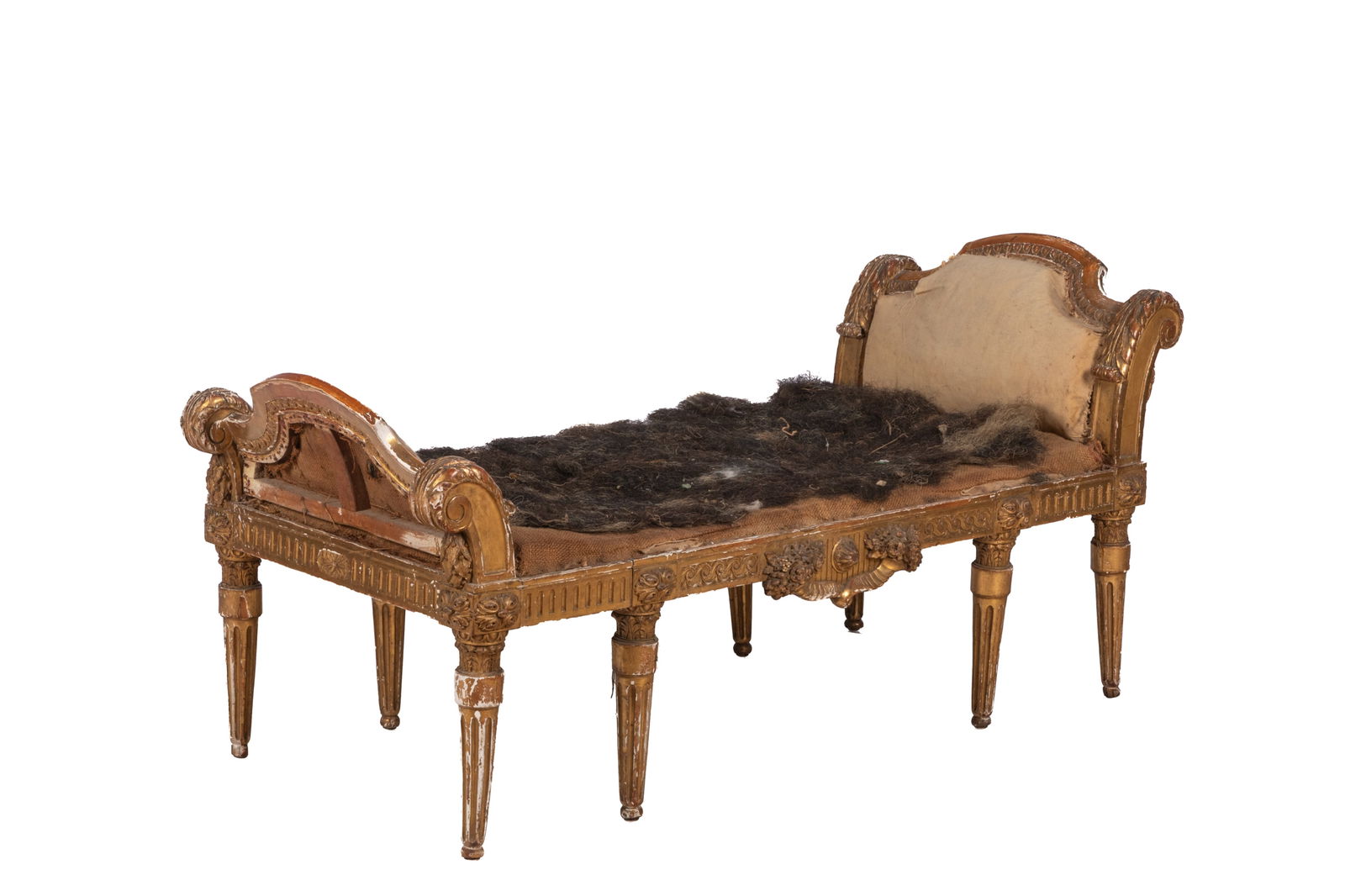 18th C FRENCH GILTWOOD CHAISE LOUNGE: Finely carved French long bench frame with reeded tapering legs, original horsehair interior, no upholstery. H. 23 1/2" x W. 21" x L. 48"