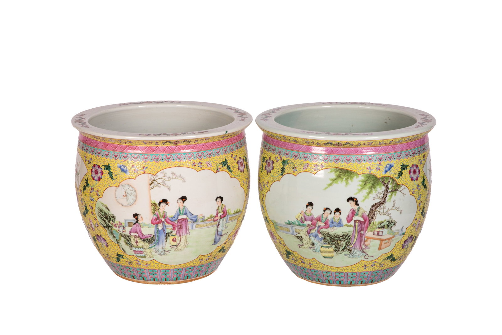 PAIR OF FAMILLE JEUNE CHINESE PORCELAIN JARDINIERE: Each jardiniere hand painted with attendants in the gardens surrounded by a floral yellow ground. H.: 35.5 cm (14 in.) Dia.: 39.5 cm (15 1/2 in.)