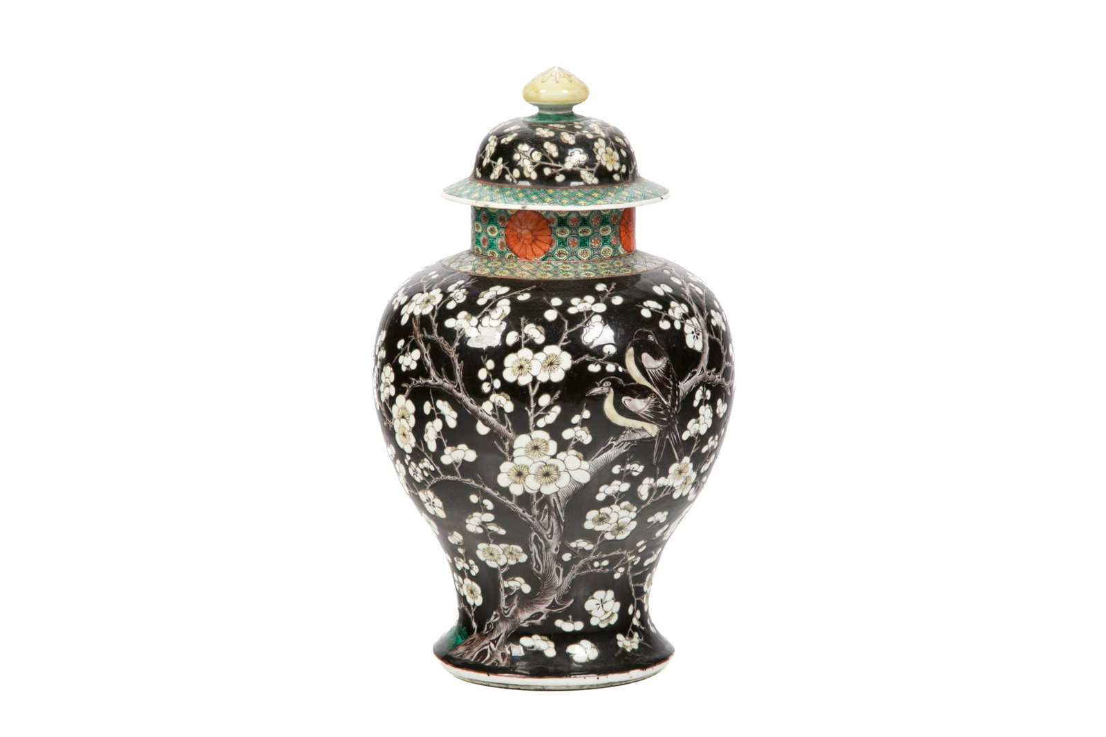 LARGE FAMILLE NOIR PLUM-BLOSSOM BALUSTER VASE: Chinese, Qing dynasty. Famille noir plum-blossom motifs atop vivid branches, green repetitive chrysanthemum patterns in the neck and cover's rim area. Restored. H. 43 cm (16 7/8 in.)