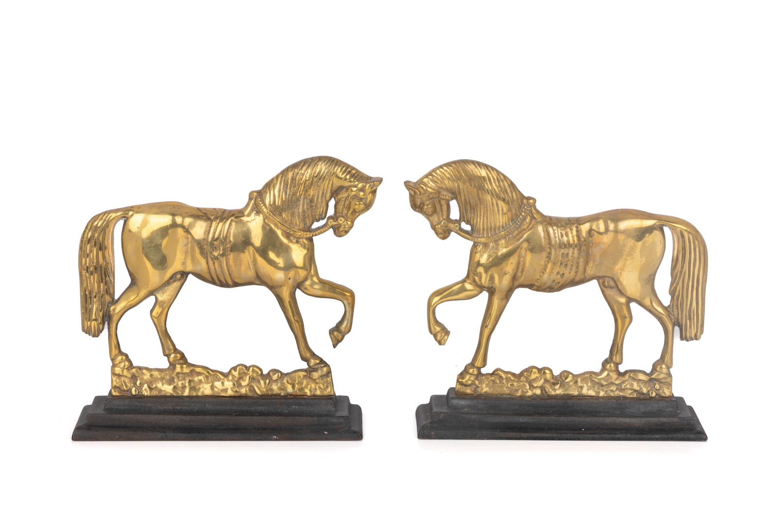 PAIR OF ANTIQUE BRASS DOOR STOPS: Pair of antique polished brass equestrian-style doorstops. H.: 9" x W.: 3" x D.: 3"