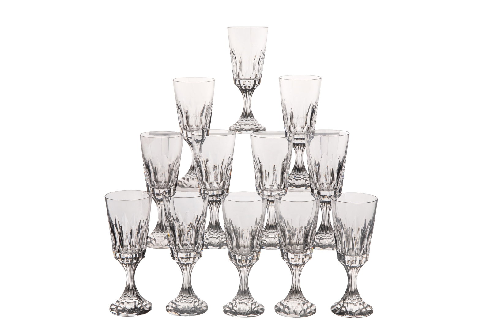 THIRTY-THREE BACCARAT 'D'ASSAS' GLASSES: Group of thirty-three Baccarat glasses in the 'D'Assas' pattern. Stamped for Baccarat to the underside. French, 20th C. H.: 16.5 cm (6 1/2 in.)