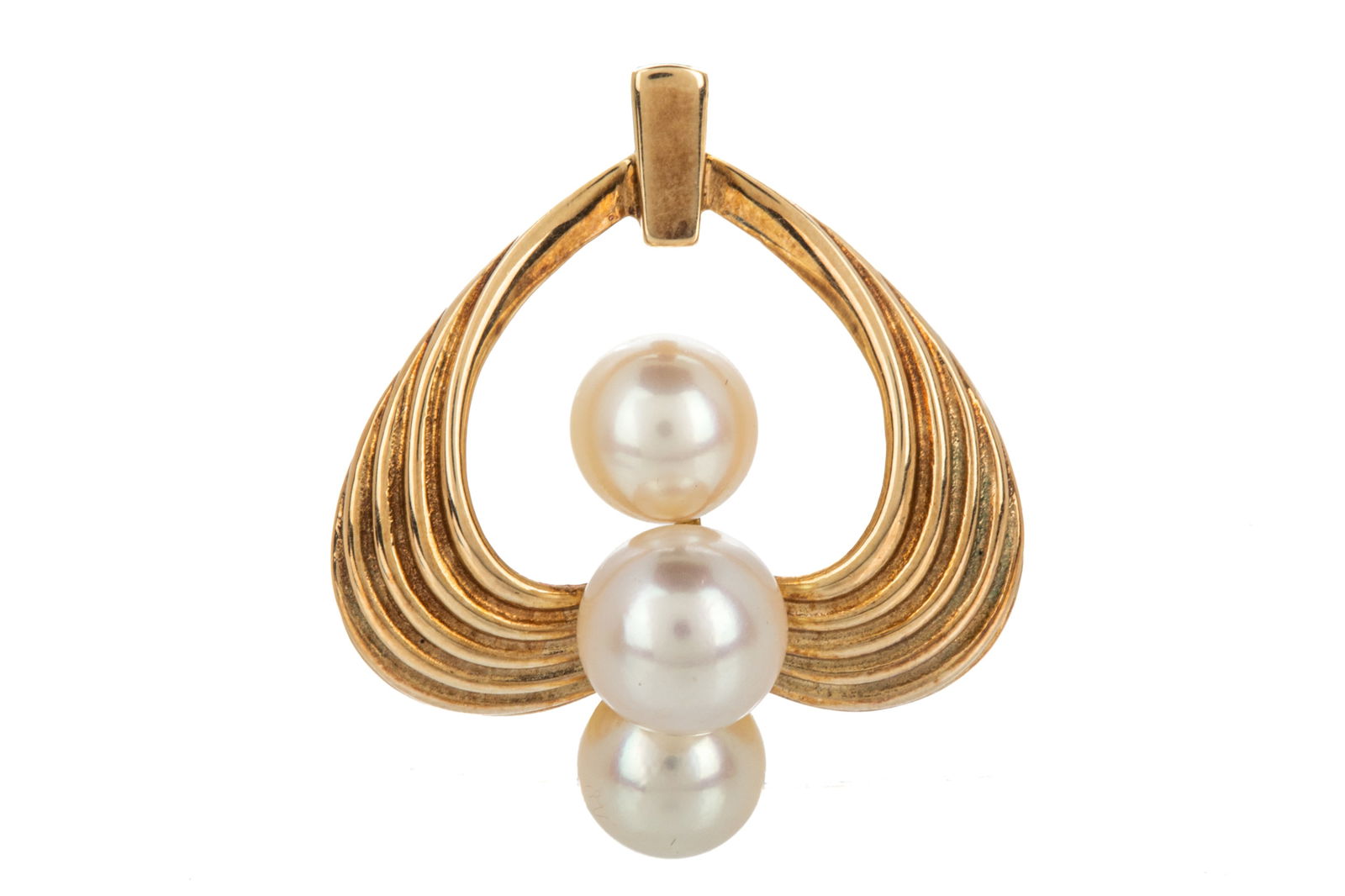 MIKIMOTO PEARL & GOLD PENDANT, 4.7g: 14k yellow gold stylized heart pendant set with three pearls by Mikimoto. L 1 1/8in