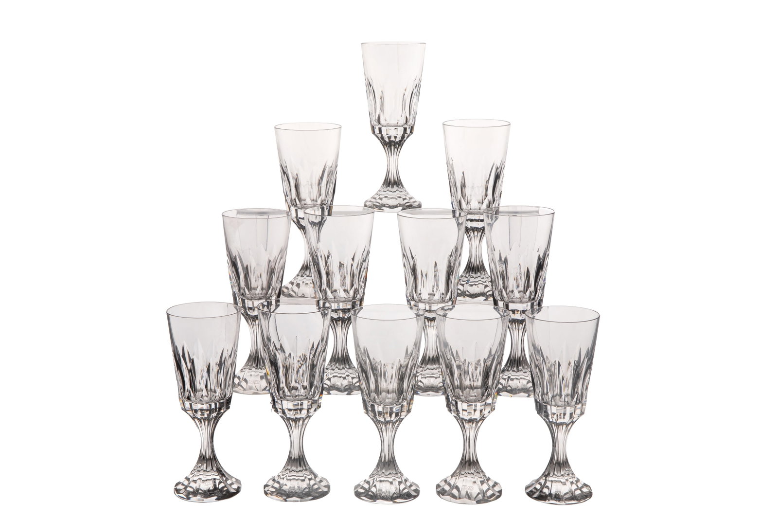 TWENTY-THREE BACCARAT 'D'ASSAS' GLASSES: Group of twenty-three Baccarat glasses in the 'D'Assas' pattern. Stamped for Baccarat to the underside. French, 20th C. H.: 17.75cm (7 in.)