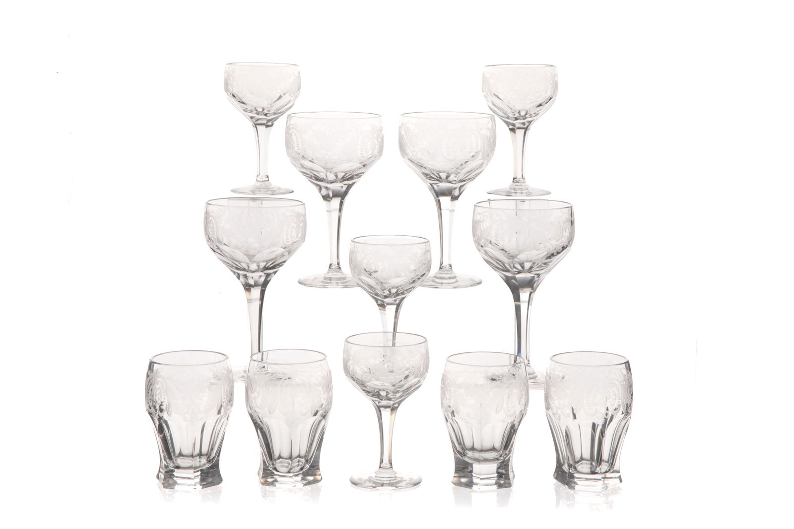 FOURTY SIX PC CUT GLASS STEMWARE SET: Includes: 10 water glasses: H. 4 1/16" 8 port glasses: H. 4 3/4" 12 white wine glasses: H. 5 1/8"16 red wine glasses: H. 6"