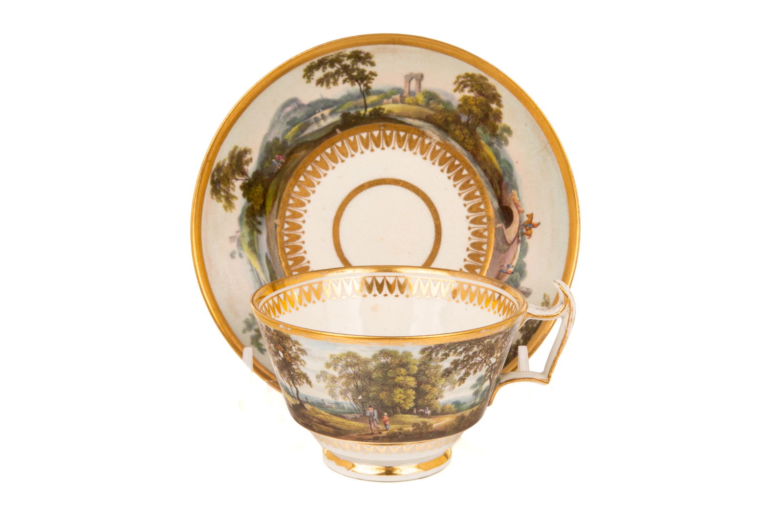 19th C DERBY PORCELAIN TEA CUP & SAUCERS: Hand painted with a landscape and architectural ruins around the cup and saucer accented with gilding, painting attributed to Zachariah Boreman (1738-1810), Regency period, early 19th C.H 2.5" x D 5.5