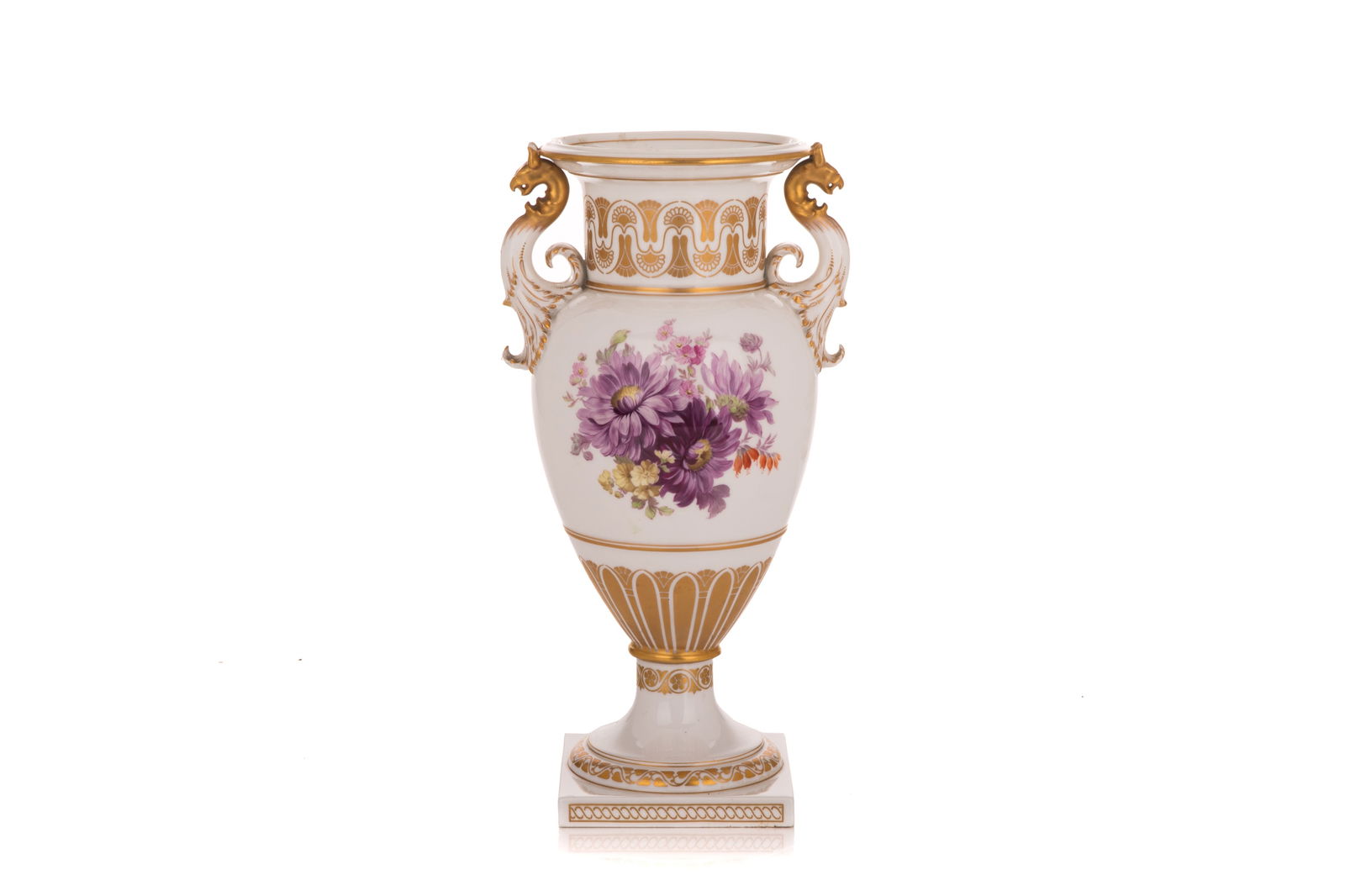 KPM GERMAN PORCELAIN URN-SHAPED VASE: Hand painted with purple flowers, gilded neoclassical accented and gryphin handles. Early 20th C. H. 12 1/4"