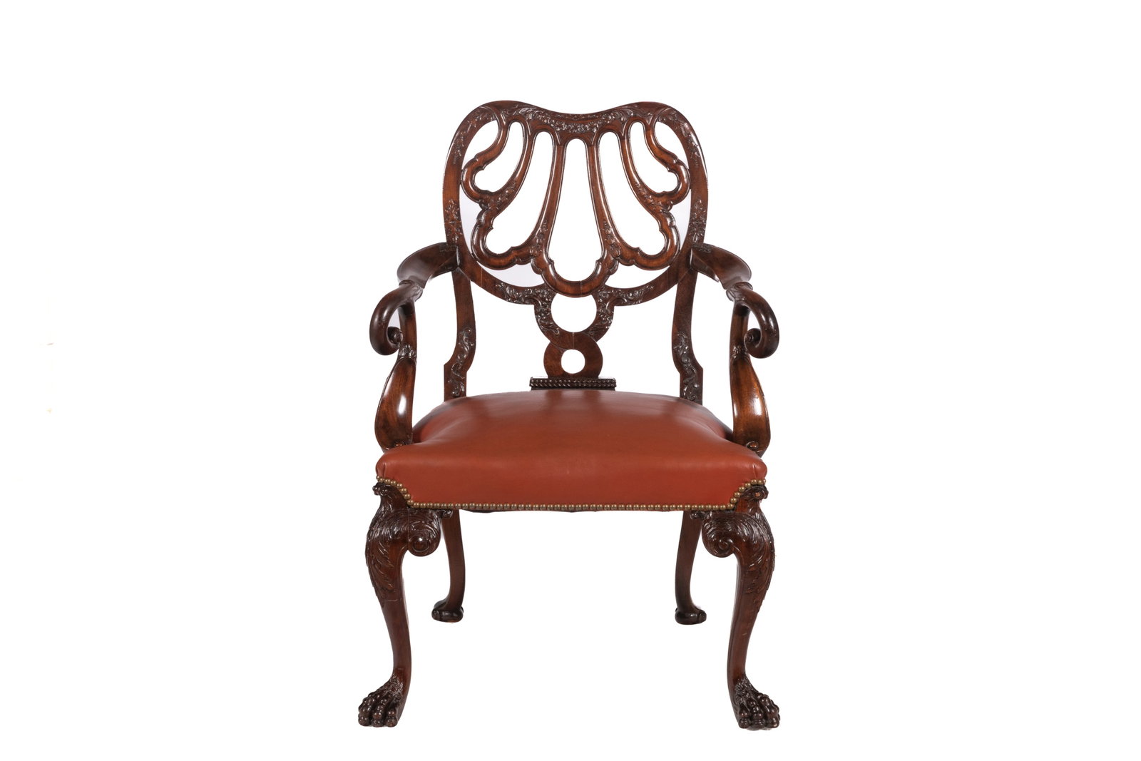 ENGLISH MAHOGANY GILES GREDEY MANNER ARMCHAIR: George II manner with orange leather seat and studded detail, heavily carved claw feet with acanthus capped cabriole legs. English, 19th C. H 39 x W 26 x D 21 1/2in