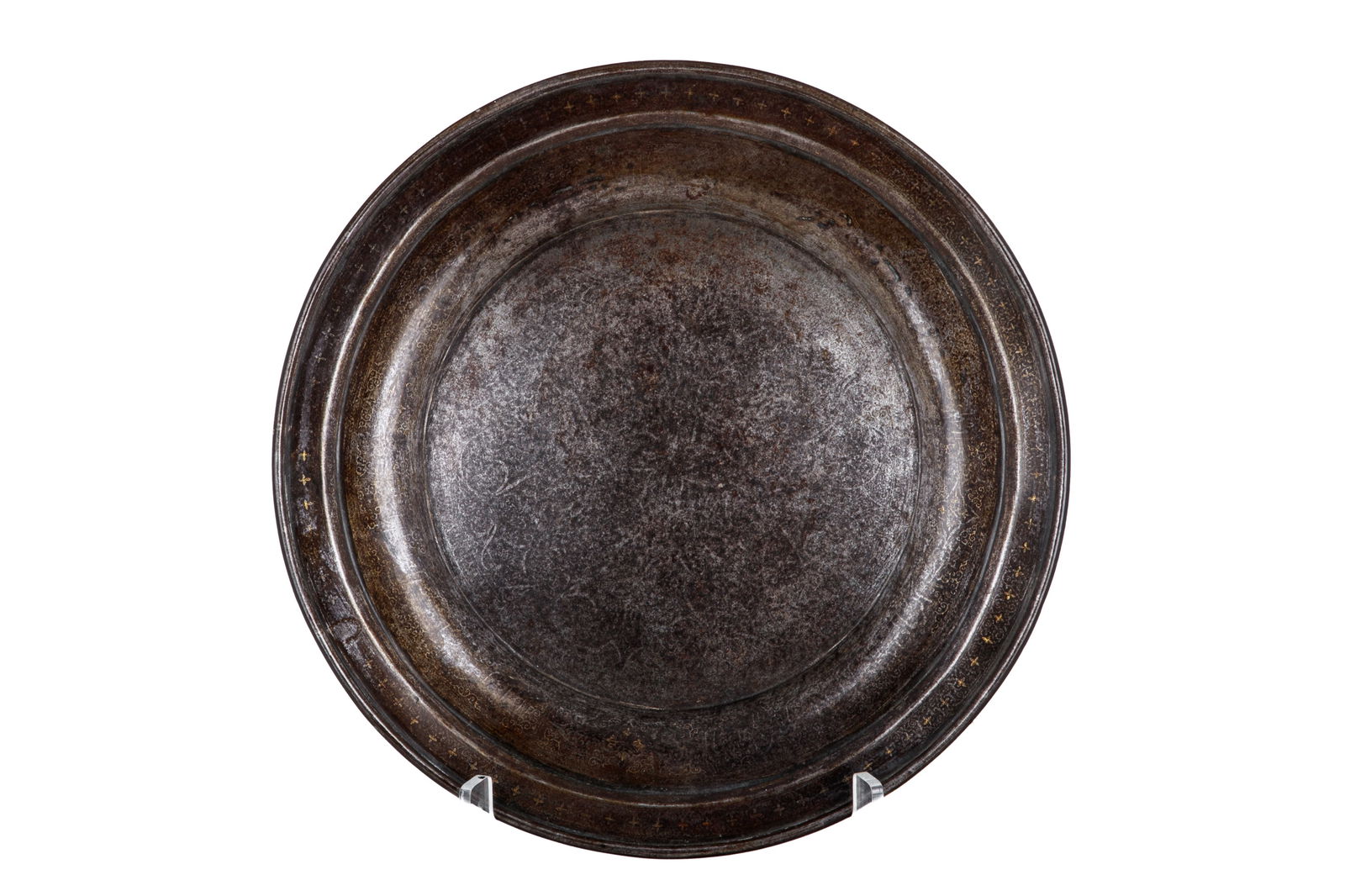 ISLAMIC STEEL CHARGER PLATE WITH GOLD INLAY: Mixed metal inlay decoration throughout, old label suggesting the piece is 16th C. Dia 38cm (15in)